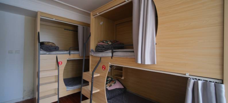 背个小包太空舱青年旅社(万象城店)图片