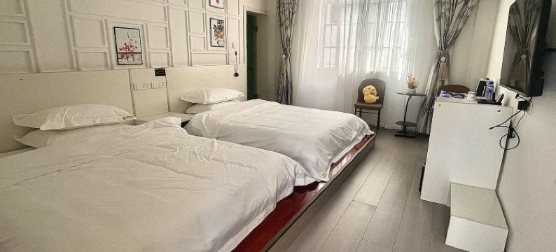 大理摘月酒店(大理高铁站洱海公园店)图片