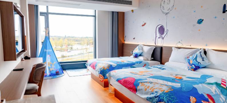 丽橙酒店(岳池火车站龙湖公园店)图片