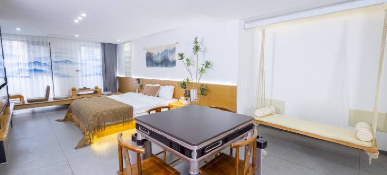 一宿酒店(乐山高铁站世豪广场店)图片