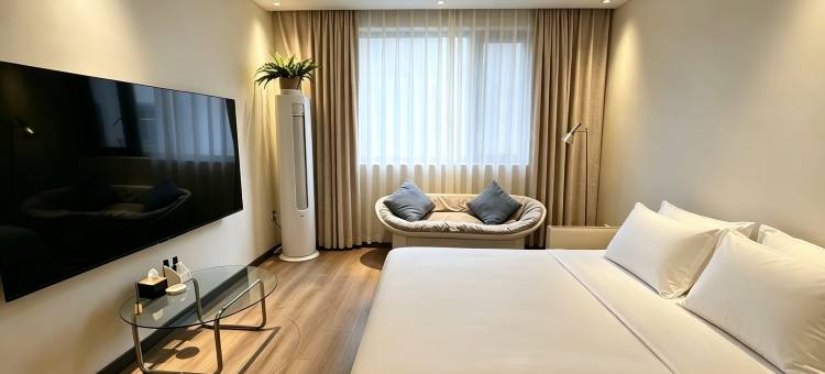 施秉SNOOZE INN思意酒店(中国漂城步行街店)图片