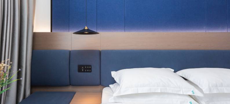 石头酒店(凯里市区万达广场店)图片