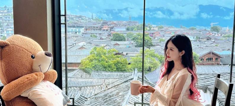 俏半山一城·设计师观古城雪山屋顶咖啡美宿(丽江古城大水车店)图片