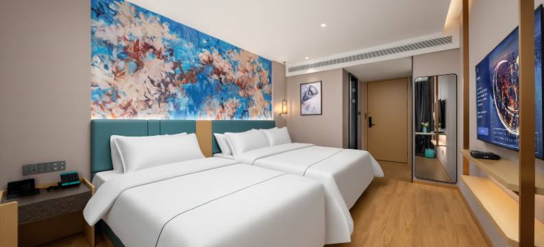 白玉兰商务酒店(青岛东方伊甸园金茂览秀城店)图片