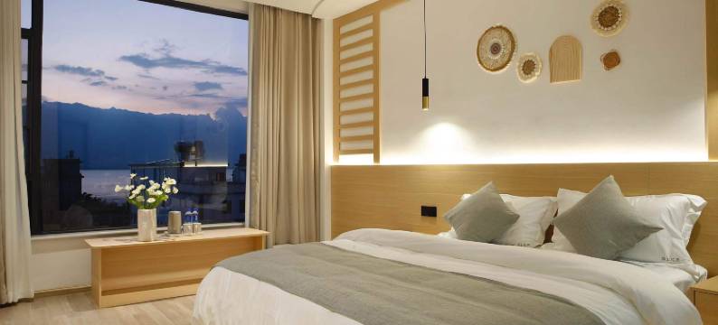 大理洱上花开海景客栈(洱海公园高铁北站店)图片