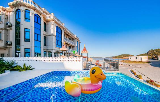 初夏里・MirrorPool Isle 一线海景泳池设计师美宿(樟洲村店)图片