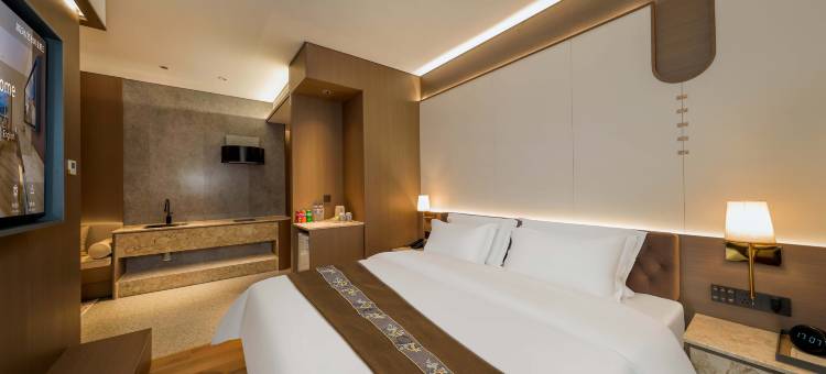 唯鑫锦中居酒店(锦州中央南街红星美凯龙店)图片