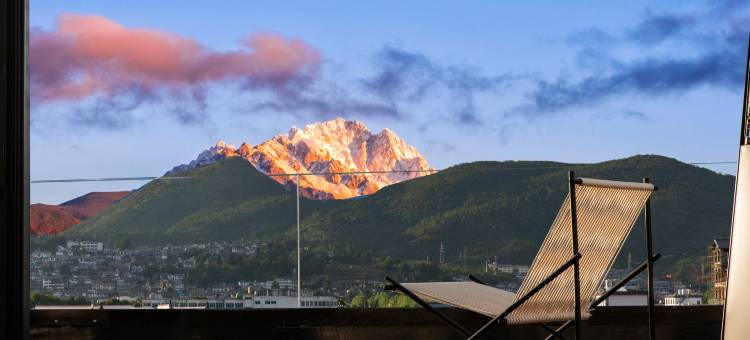 既见山野丨日照金山空中花园雪山观景隐奢度假酒店(丽江古城店)图片
