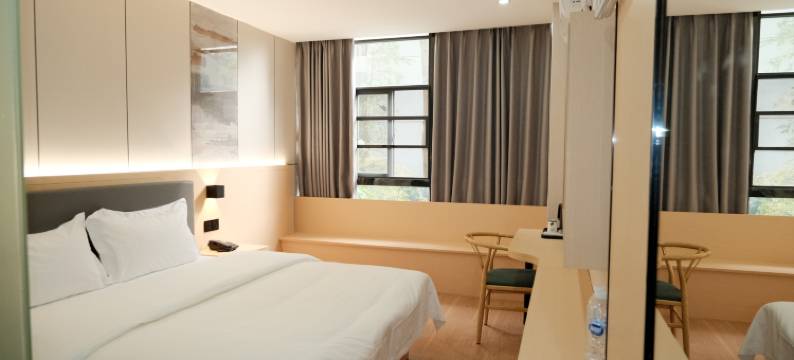 深圳金荷花商务酒店(坪山高铁站店)图片