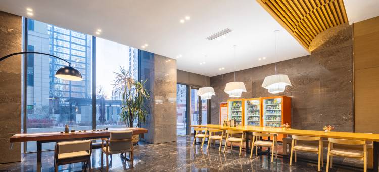 悦栖云尚轻奢民宿(沈阳奥体中心浑河外滩市集店)图片