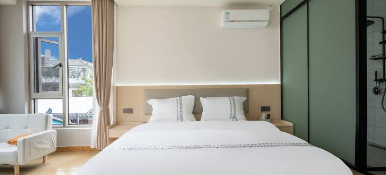 蓝杉民宿(丽江三义国际机场店)图片