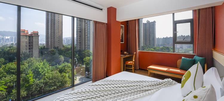 花溪纳莱酒店(西双版纳景洪泼水广场曼听公园店)图片