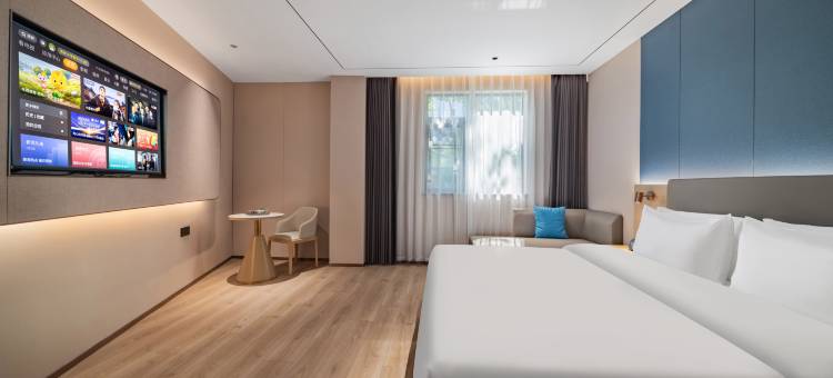 艺龙安悦酒店(上海第二工业大学顾唐路地铁站店)图片