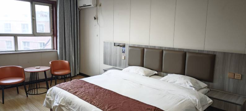 麦盖提川缘聚宾馆(卡龙情中央广场店)图片