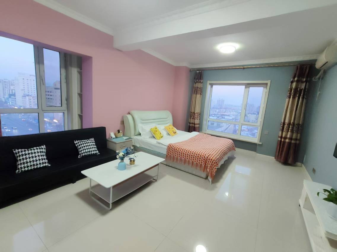 暖阳小居民宿(维港城店)