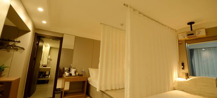 桔栀春天影院酒店(滨海家园店)图片