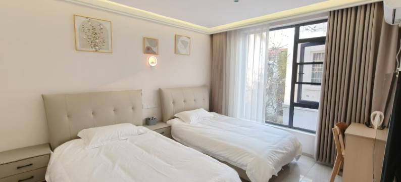 开封上岸民宿(万岁山武侠城店)图片