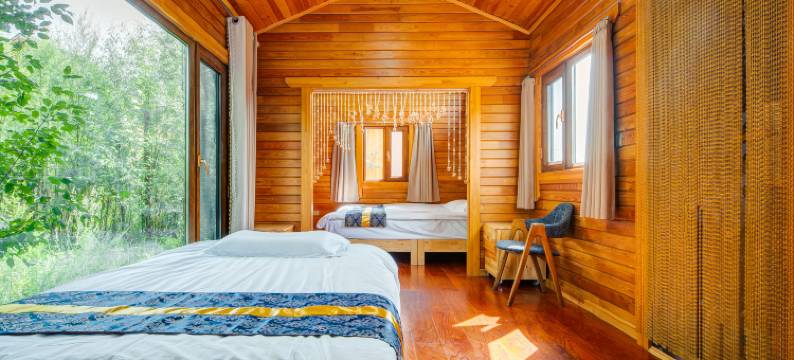 呼伦贝尔根河根林木屋宾馆图片