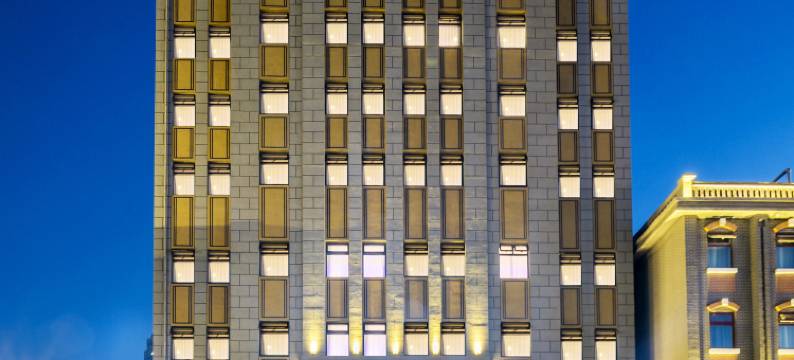 力曼解百纳酒店(烟台山景区火车站店)图片