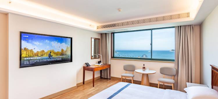 启明假日酒店(威海半月湾沙滩店)图片