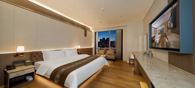 唯鑫锦中居酒店(锦州中央南街红星美凯龙店)图片