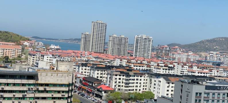 青橙湾度假民宿(山东大学国际海水浴场店)图片