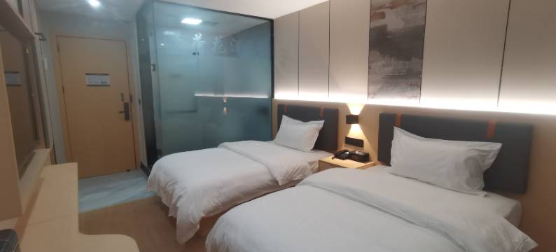 深圳金荷花商务酒店(坪山高铁站店)图片