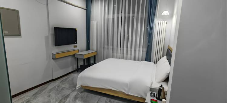 哈尔滨夜归人民宿(江北大学城地铁站店)图片