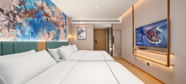 白玉兰商务酒店(青岛东方伊甸园金茂览秀城店)图片