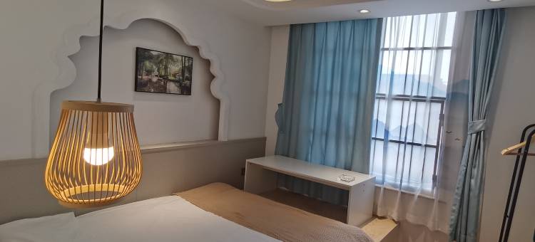 云归·自助酒店(犀浦地铁站店)图片