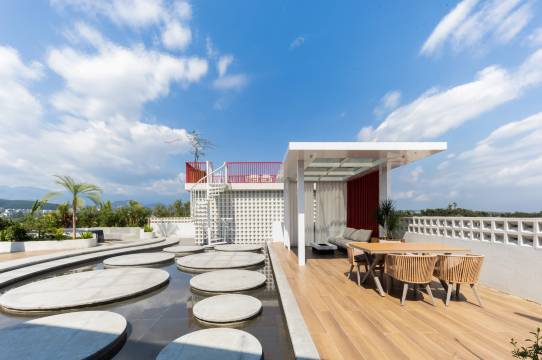 云朵蘭锦鲤花园泳池酒店(西双版纳景洪勐泐大佛寺店)图片