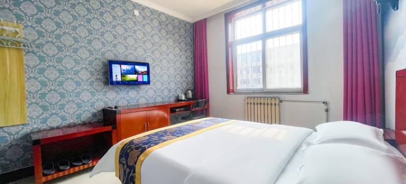 迁安新世佳商务宾馆(财富中心店)图片