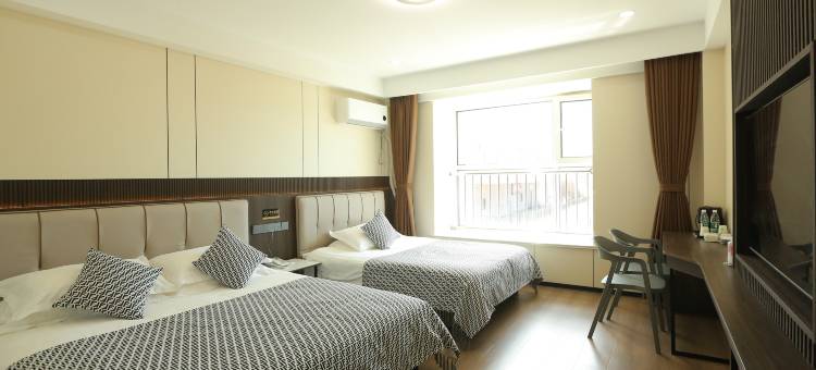 都市118精选酒店(蓬莱阁第一海水浴场店)图片