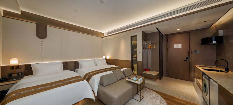 唯鑫锦中居酒店(锦州中央南街红星美凯龙店)图片