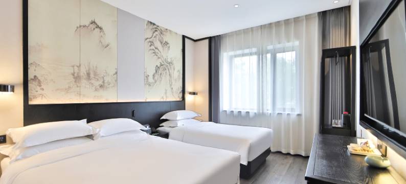 小城顾氏精品文化酒店(长春火车站西安桥轻轨站店)图片