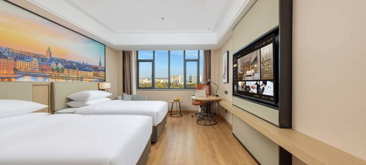 维也纳国际酒店(准东开发区五彩湾新城店)图片