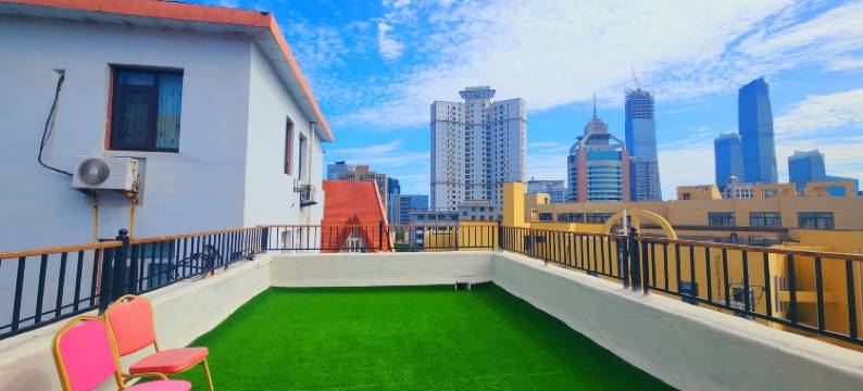 邻海畔公寓(万象城五四广场地铁站店)图片