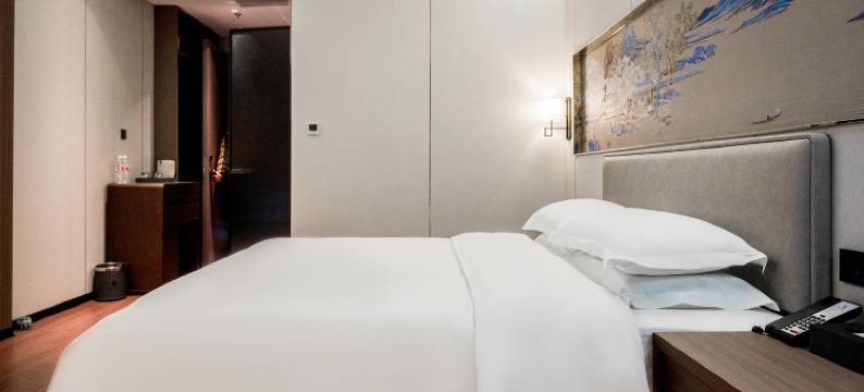 如家旗下UP华驿精选酒店(呼伦贝尔市莫力达瓦达斡尔族中学店)图片