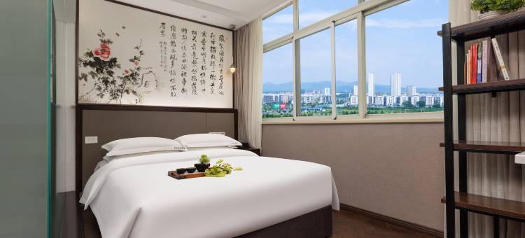 毕节盘古书香精品酒店(毕节市中医院人民公园店)图片