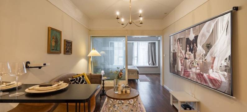 漫漫设计师民宿(观音桥步行街协信中心店)图片