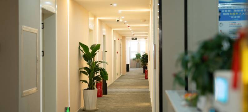 归宿轻奢名宿酒店(潢川汽车站店)图片