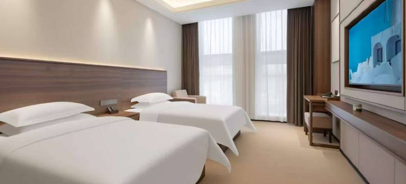 千巨酒店(榆林火车站交大一附院店)图片