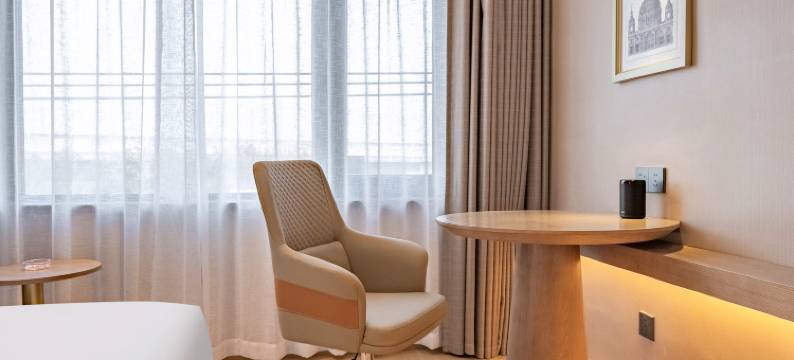 维也纳酒店(彭山青龙镇店)图片