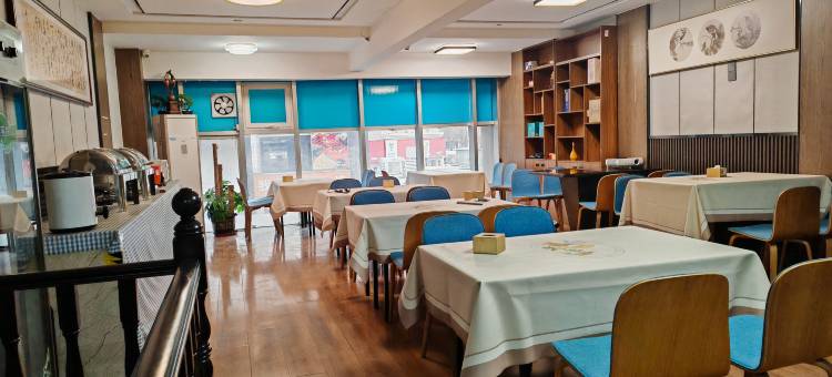 慧眠酒店(天山世界之门店)图片