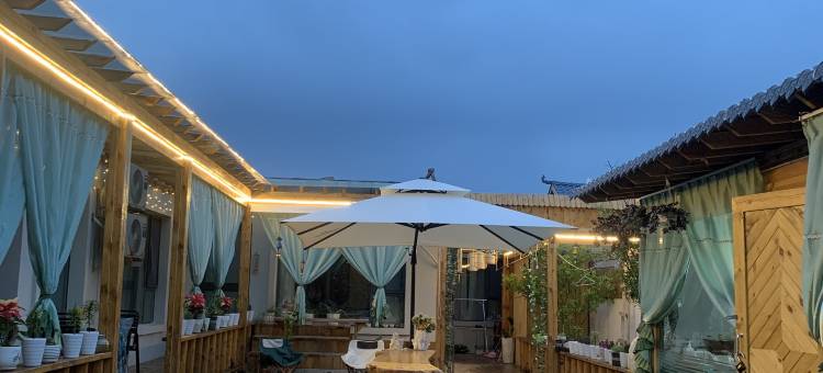 特克斯胡杨木阁民宿(八卦城离街店)图片