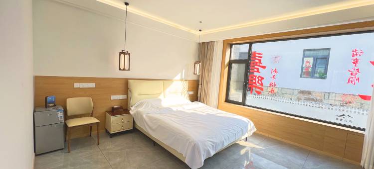 奈古青岚民宿(西霞口动物园店)图片