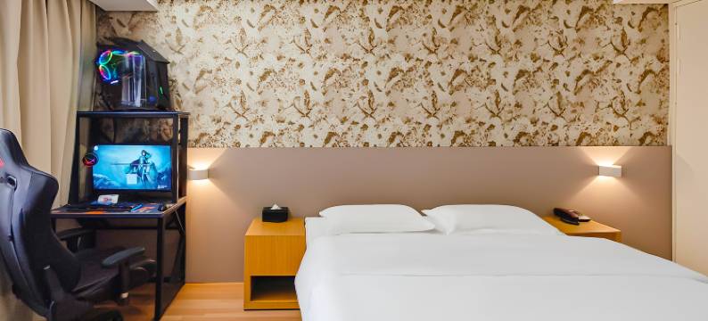 竞放电竞酒店(广州花都狮岭皮革城店)图片