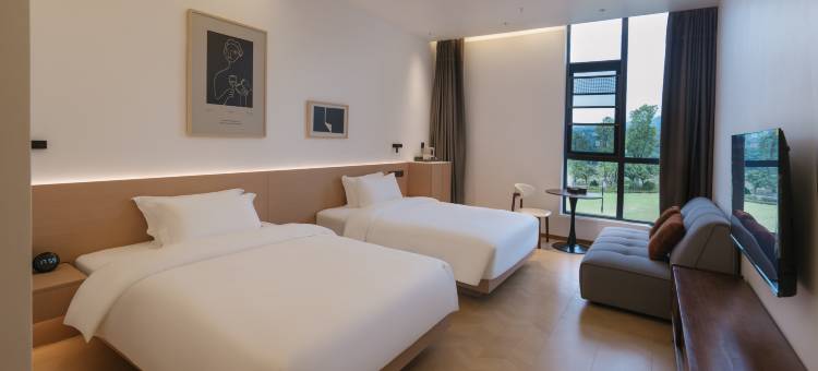 高县逸尘精品酒店(湿地公园店)图片