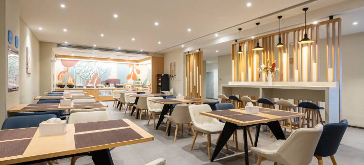 万嘉精品酒店(天津滨海国际机场王府井奥莱新燕莎小镇店)图片