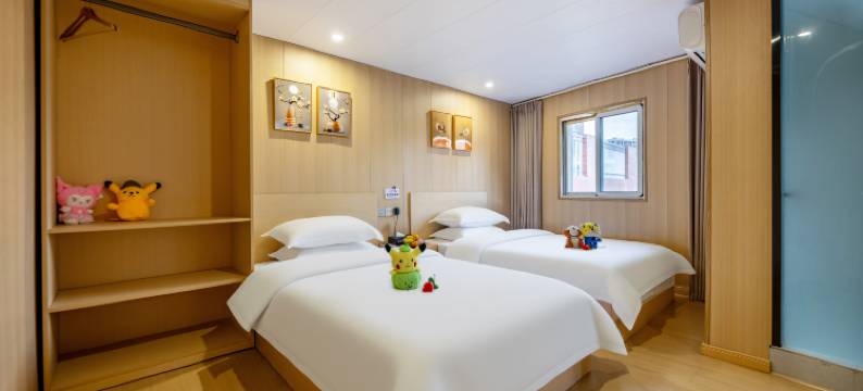 洋毅投影小院民宿(九江火车站第七中学店)图片